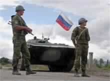 Georgian PM Shot at, Envoys Try to Keep Peace in South Ossetia